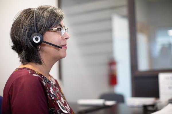 image of receptionist on telephone