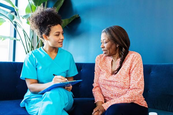 nurse talking to patient 