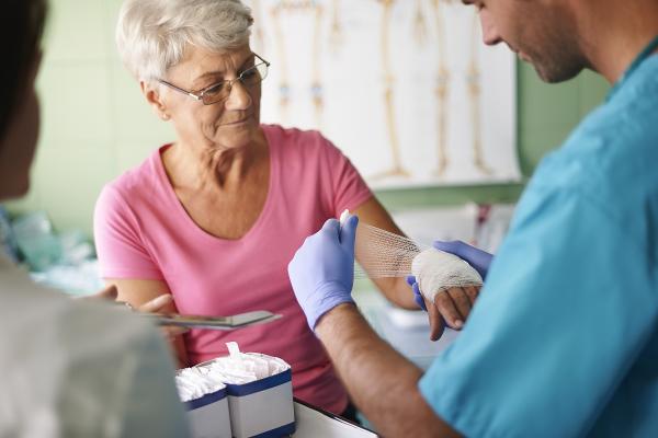 nurse providing wound care